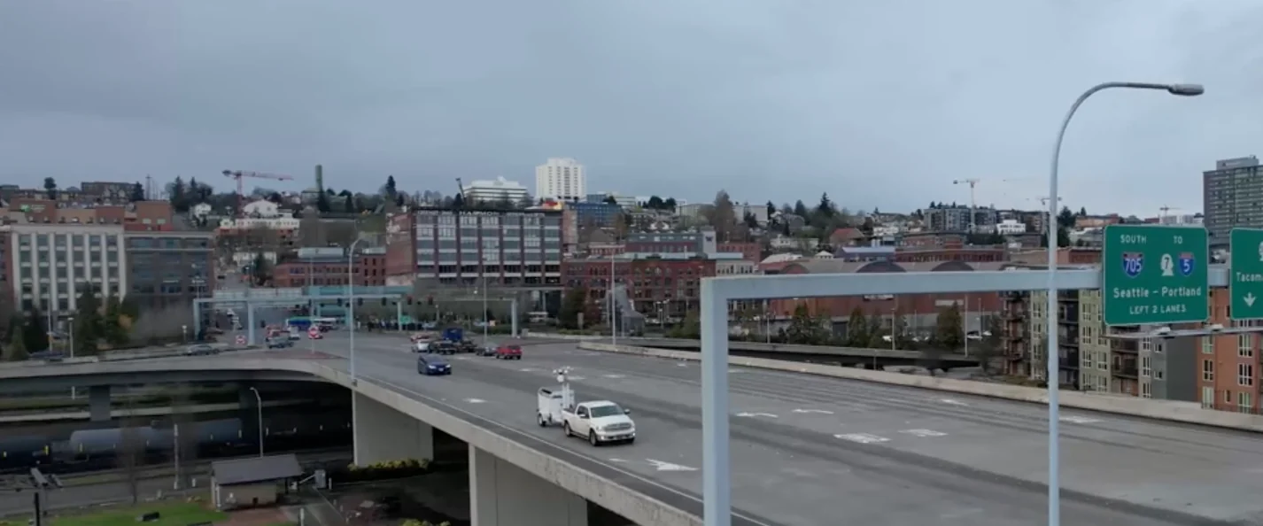 Mobile surveillance trailer with Tacoma Dome in background - Security rental pricing